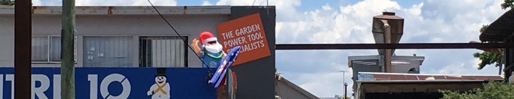 Santa heading down a chimney at Blackheath, NSW (cropped)